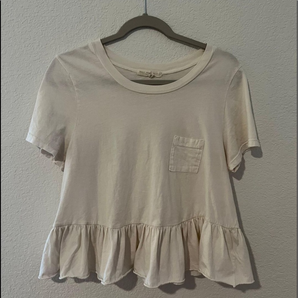 cream ruffle top